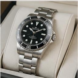 Rolex Submariner 16610 — Box & Papers